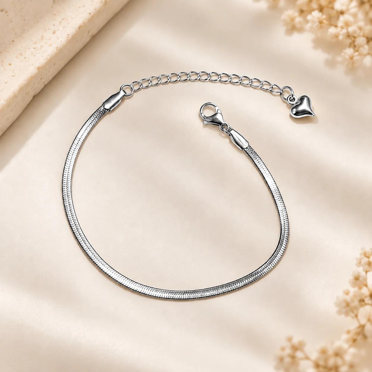Celeste Silver Serpent Heart Charm Bracelet by Soni De Nakhre